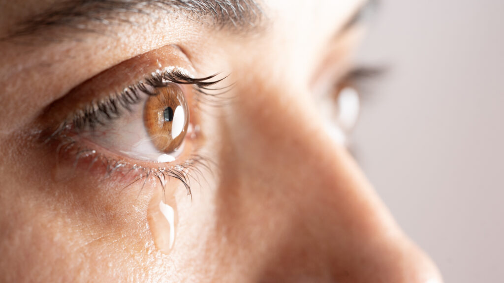 Close up crying female eye